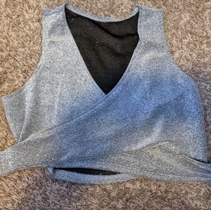 Glitter top that crosses over the breasts and ties in the back